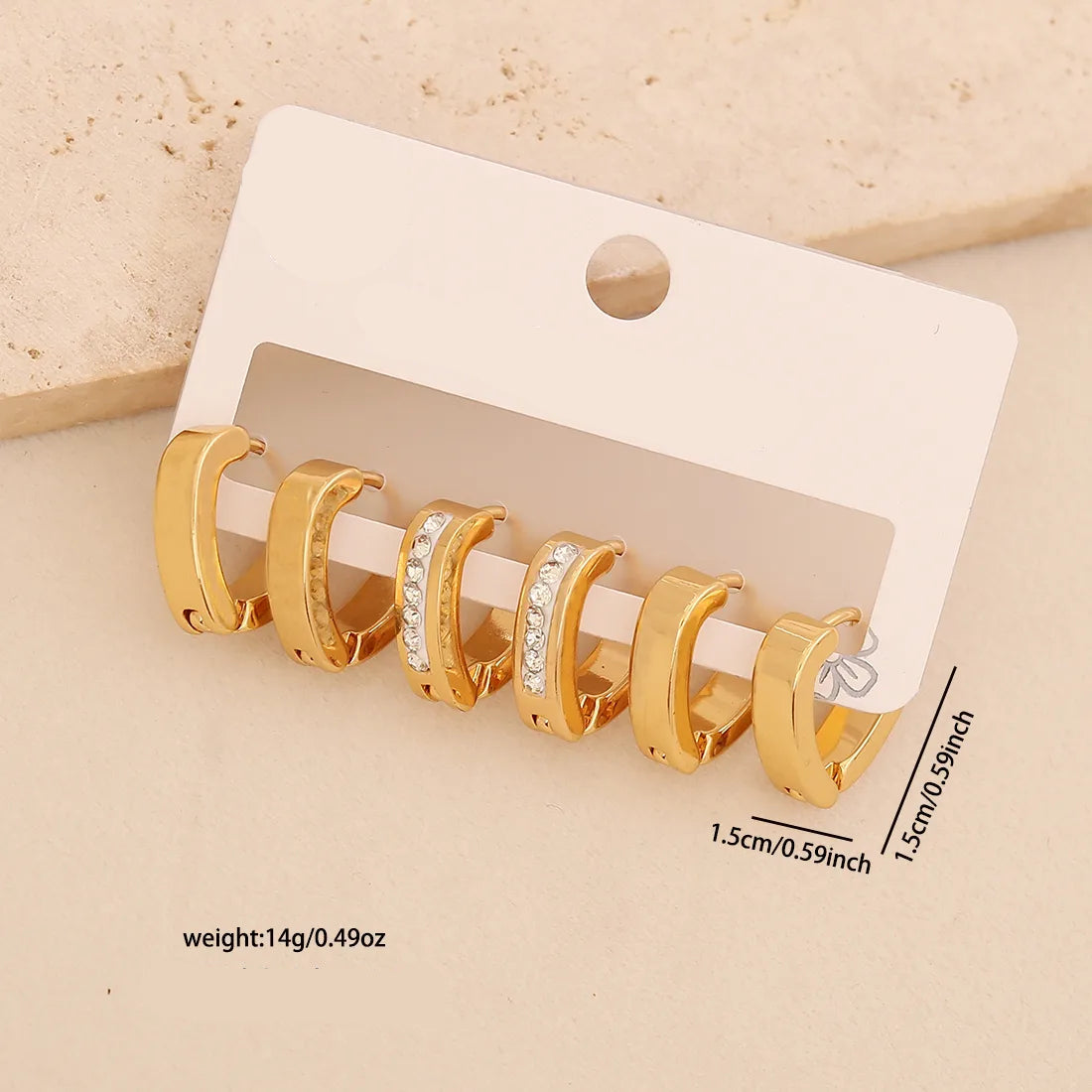 3 pares de aretes de aro dorados