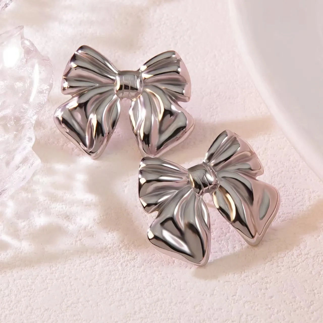 Aretes de moño