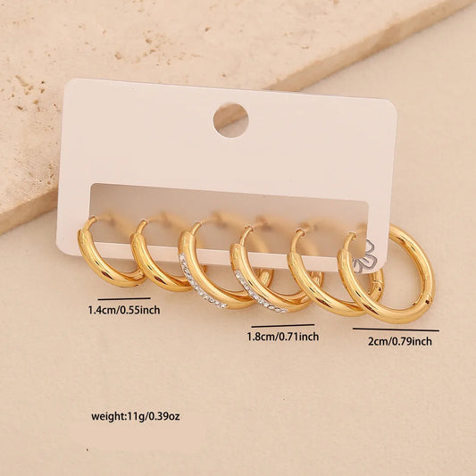 3 pares de aretes de aro dorados