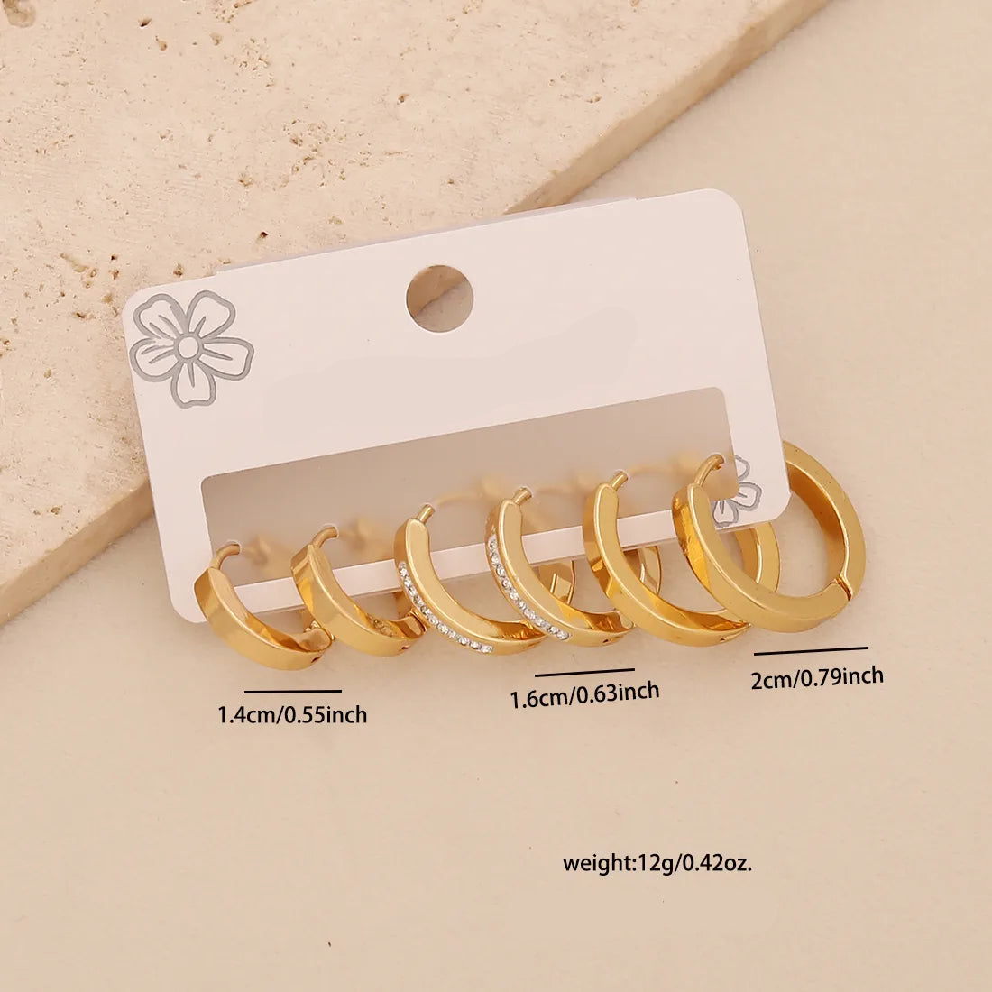 3 pares de aretes de aro dorados