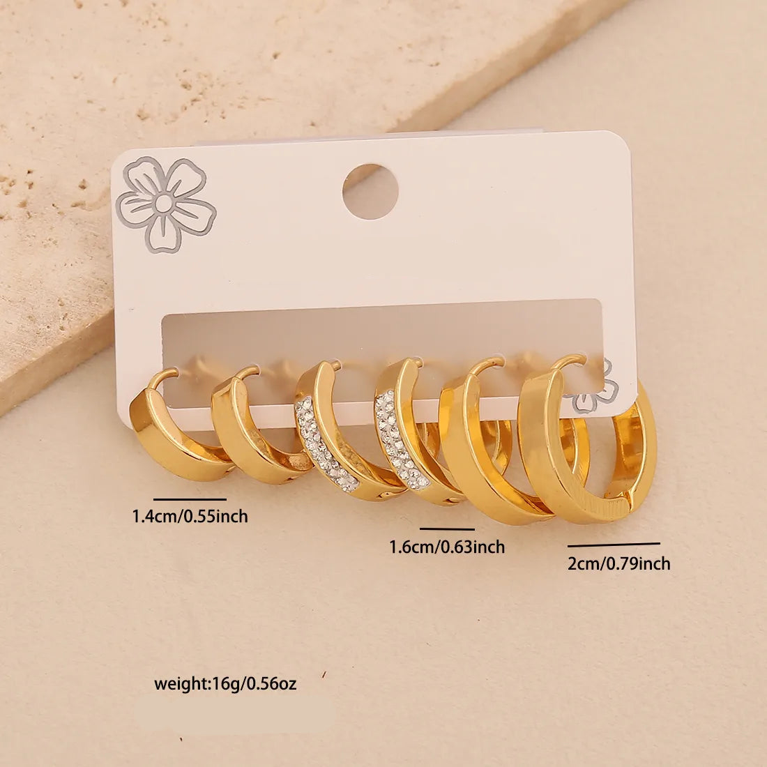 3 pares de aretes de aro dorados