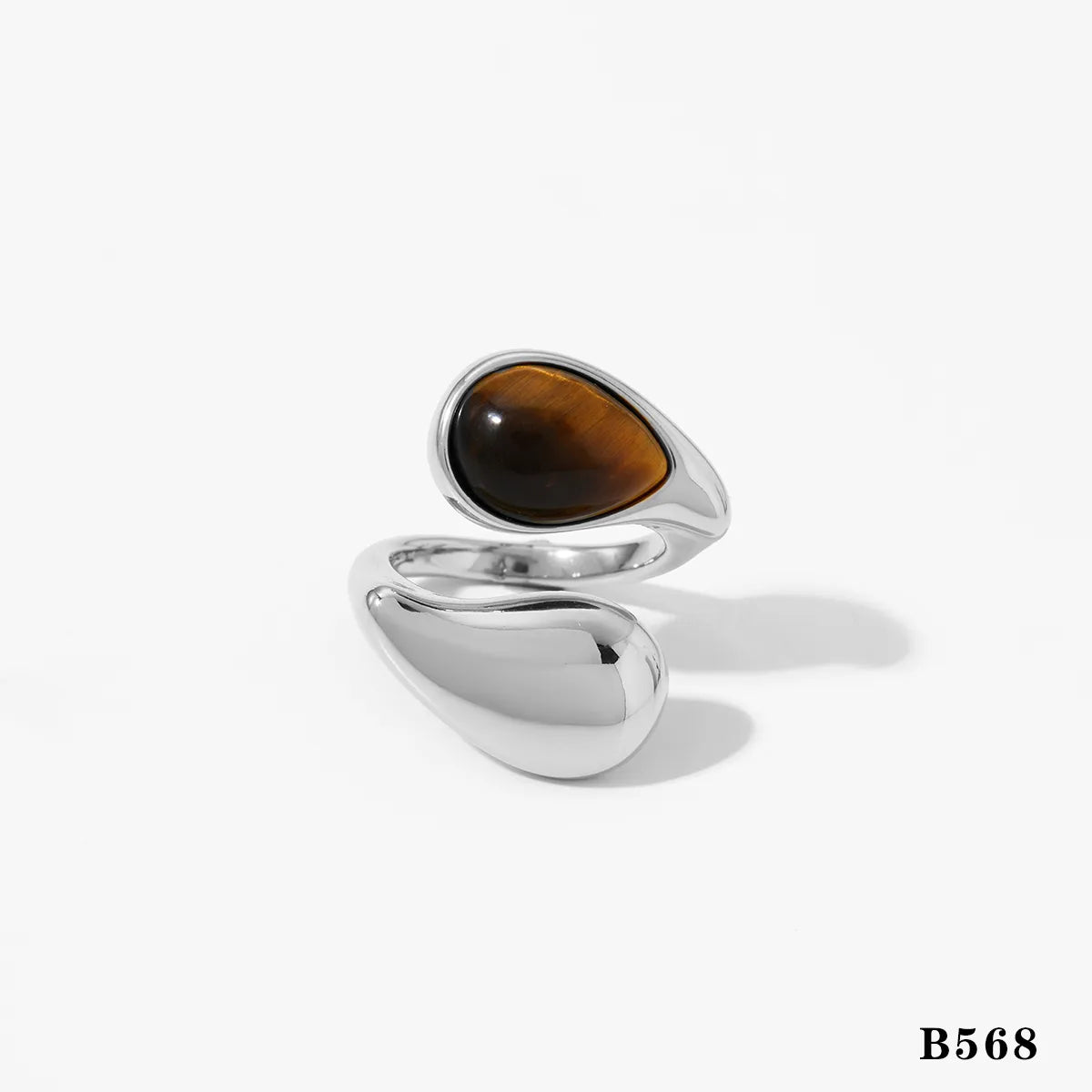 Anillo plateado de perla blanca y café